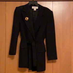 Wrap around jacket with gold pin